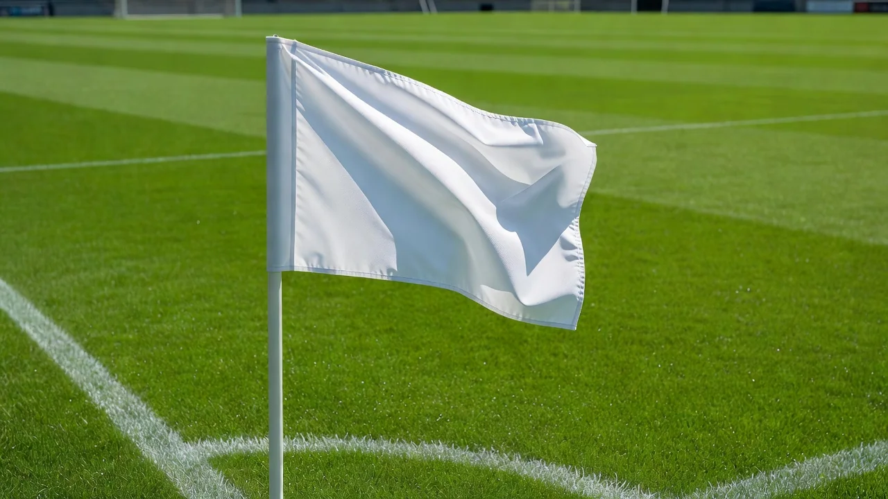 Blank white corner flag fabric waving in bright sunlight